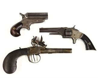 Three antique firearms.  Includes a .32 Caliber C. Sharps & Co. Model #2 four barrel Pepperbox Pistol, 4 shot with 2 1/2" barrel and Blued frame with Rosewood grips, marked "C. Sharps Patent, Jan 25. 1859" at frame; an approx. .48 Caliber French Flintlock Pistol with 3 7/8" engraved barrel, engraved Steel frame and checkered Walnut grips, marked "B. Spirlet Fabrit A Liege" at underside of barrel; and a .22 Caliber Smith & Wesson Model 1 Revolver, 2nd Issue, 7 shot single action with 3 1/4" octagonal tip-up barrel, Blued frame and Rosewood grips, serial #45256 on butt, marked "Smith & Wesson Springfield Mass" at barrel and patent information at cylinder.  