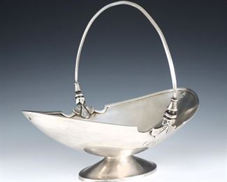 A late 19th century Gorham "Athenic" pattern Sterling Silver basket retailed by D.C. Jaccard & Co.  Footed oval basket with floral Art Nouveau design.  Impressed Gorham and retailer marks with "Sterling" and "481 E".  15.08 troy ozs total. 
