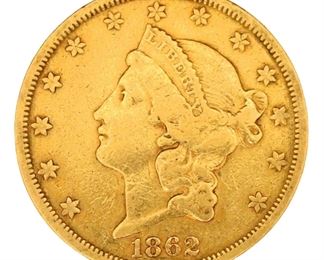 An 1862 S U.S. $20 Gold Liberty "Double Eagle" coin.  Circulated with wear and minor damage.  33.2 grams total.