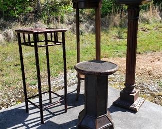 Many plant/sculpture stands. 