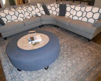 Sectional Couch, Pillows, Foot Stool and rug