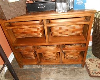 Storage shelf with pull out baskets