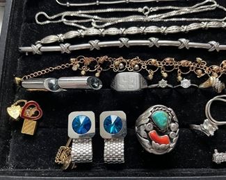 Lots of sterling silver and a big turquoise ring is a massive men’s ring by the marking. I believe it is Indian made.