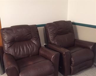Two leather Lazy boy rocking recliners. 