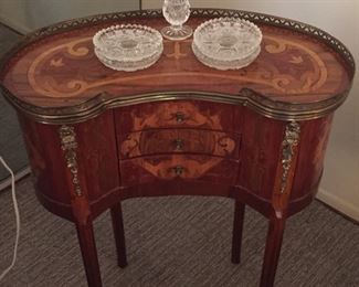 Beautiful kidney shaped inlaid side table. 