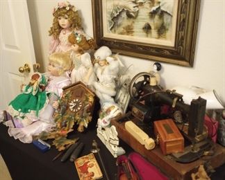 Antique sewing machine, porcelain dolls and other vintage