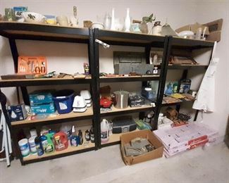 Garage shelving, tools, and yard equipment