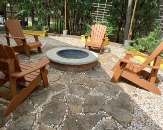 Four annirondack chairs nicely constructed durable wood 