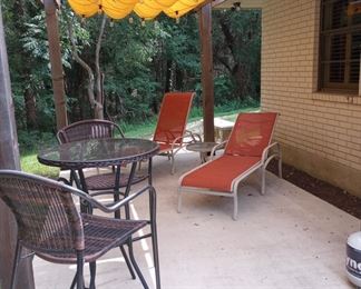 Bar height bistro set and chaise lounges