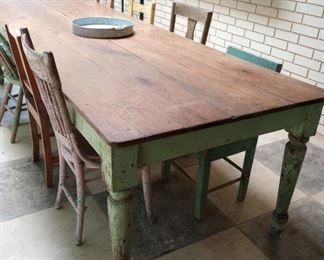 This beauty was purchased from wimberley constructed with reclaimed wood. Each chair is different and a different color it is amazing. It has been kept inside a screened patio and could work inside of a home or on your back porch.