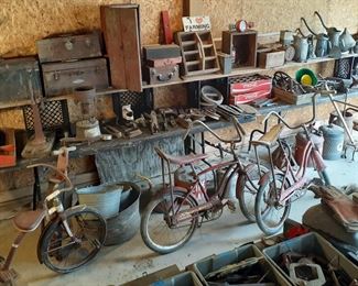 primitive, boxes, oil cans, pulleys, banana seat bikes, tricycle, tool boxes, gas cans, tins, license plates, Coke cases