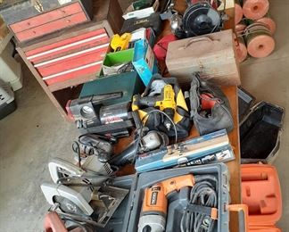 circular saws, Dewald cordless drill, sanders, tool chest, bench grinder, Ridgid hammer drill, angle grinder, bale twine, welding helmet