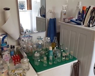 milk bottles, jars, bath supplies