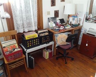 office supplies, desk, chair, vinyl records, typewriter