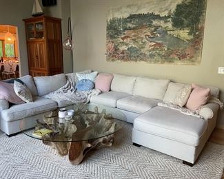 White sectional sofa.  Coffee table, pine cabinet and light are not for sale.
