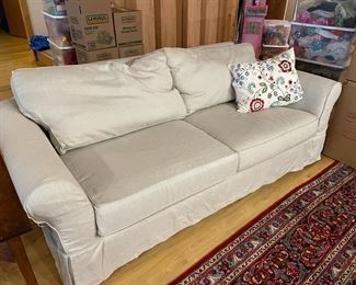 Pottery Barn slipcovered Comfort Sofa with extra set of slipcovers.