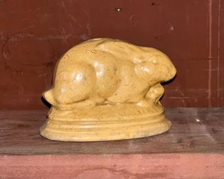 Yellow ware rabbit bank