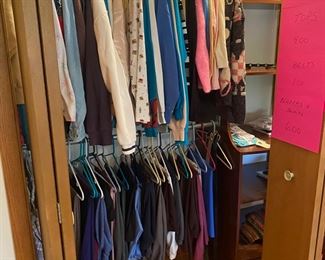 Women’s clothing size large, and medium petite