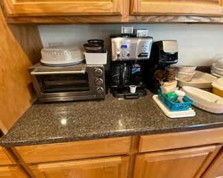 Cuisinart, toaster, oven, and coffee maker
Hamilton beach single serve coffee maker