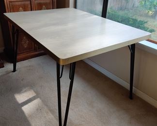 1950's MCM hairpin leg, laminated top with wood grain design Dining table .