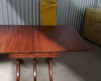 Restored Solid Wood Cherry Drop Down Table With 2 Leafs & Brass Leg  Feet Covers Measures: Open 55.5"W x  38.25"D  Closed 26"W    Leafs 14"W x 38.25"D 