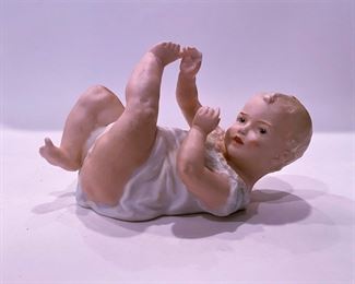  Bisque Porcelain Piano Baby Figurine  by Gebruder Heubach of Germany