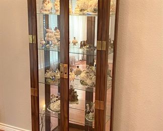 Nice curio display cabinet with an interior light
