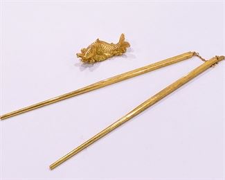 Risis gold plated chopsticks & Koi carp rest........To register in order to place bids go to www.capitolsalesservices.hibid.com