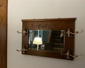Antique oak mirror with brass hooks