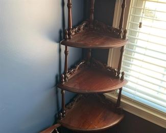 #56	Corner shelf w/ 5 shelves 17x17x58h	 $100.00 			
