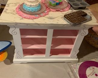 #64	American . Girl Kitchen Island	 $25.00 			
