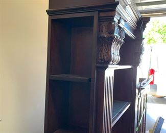 #105	Bookcase with glass shelves (lighted) 47x12x77"	 $175.00 			
