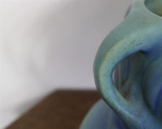 Another view of the Early Van Briggle Art Pottery handled vase with palm design and blue and turquoise glaze