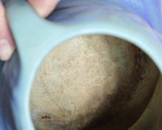 Interior view of the Early Van Briggle Art Pottery handled vase with palm design and blue and turquoise glaze