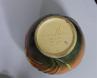 Another view of Roseville Pottery Zephyr Lily cookie jar base with Freesia patterned lid