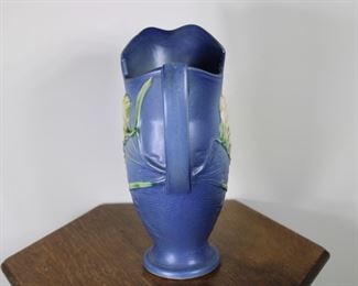 Another view of Roseville Pottery Freesia pitcher in blue, #20-10".  Tiny glaze nick on point on handle