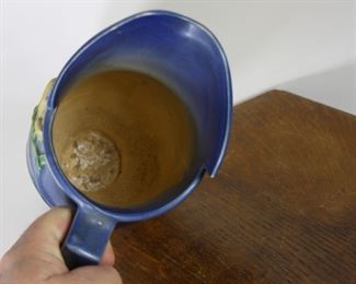 Interior of Roseville Pottery Freesia pitcher in blue, #20-10"