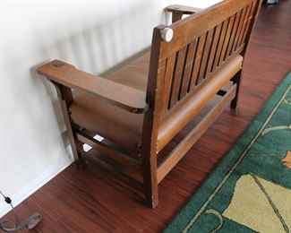 Gustav Stickley settee, real leather upholstery, possibly an old refinish, No. 212 Settle, height of back from floor 36", height of seat from floor 17", length 48", depth 21"