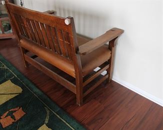 Gustav Stickley settee, real leather upholstery, possibly an old refinish, No. 212 Settle, height of back from floor 36", height of seat from floor 17", length 48", depth 21"