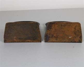 23.  $175.00  Craftsman Studios hammered copper Arts and Crafts bookends