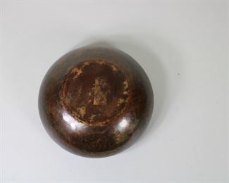 25.  $275.00  Falik Novick hammered copper bowl, 7 1/2"