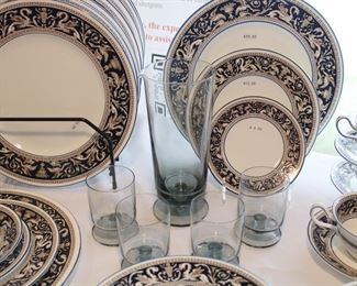 Mid Century smoked glass footed cocktail shaker and four matching footed serving glasses