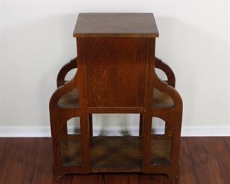 29.  Oak smoking stand with drawer and bookshelves.  30” tall, 25” across,  11 1/2” deep
