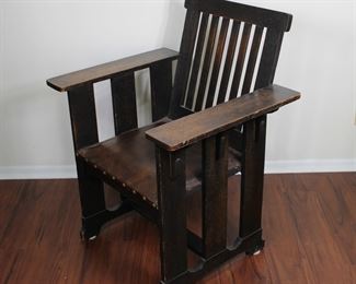 Prairie School design oak arm chair in original finish with original leather seat. 29” wide, 24” deep, 36” tall