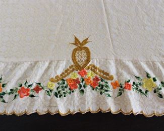 Detail on vintage machine embroidered tablecloth