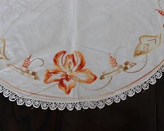 Detail on Arts and Crafts style hand embroidered table runner with Iris