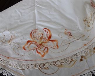 Detail on Arts and Crafts style hand embroidered table runner with Iris