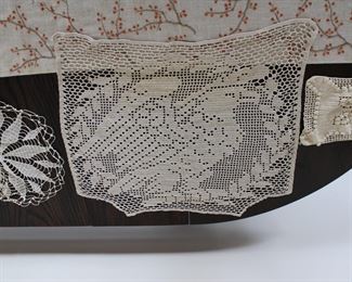 Filet lace doilie with eagle in laurel wreath