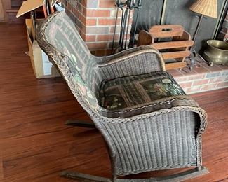 Antique willow wicker rocker in original finish, back is upholstered but only on the front side.