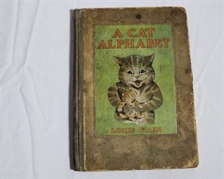A Cat Alphabet by Louis Wain, in rough condition but several illustrations are still clean